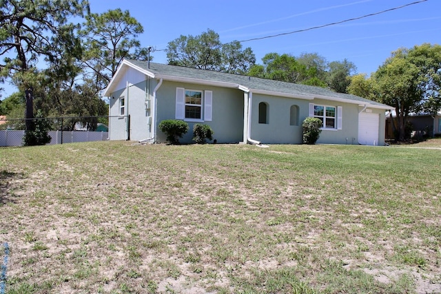 13180 Lawrence St, Spring Hill, FL 34609 - single story home featuring stucco siding and an attached garage