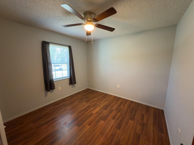 13180 Lawrence St, Spring Hill, FL 34609 - unfurnished room with dark wood finished floors, a ceiling fan, baseboards, and a textured ceiling