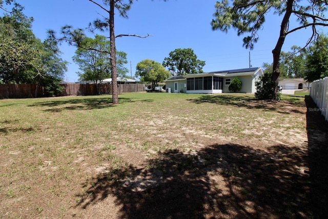 13180 Lawrence St, Spring Hill, FL 34609 - view of yard with a sunroom