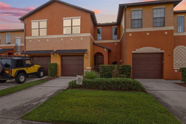 1108 Blackwater Dr, Wesley Chapel, FL 33543 - multi unit property featuring an attached garage, driveway, and stucco siding