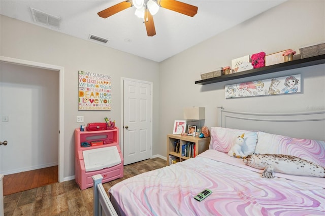 1108 Blackwater Dr, Wesley Chapel, FL 33543 - bedroom with wood finished floors, baseboards, and ceiling fan