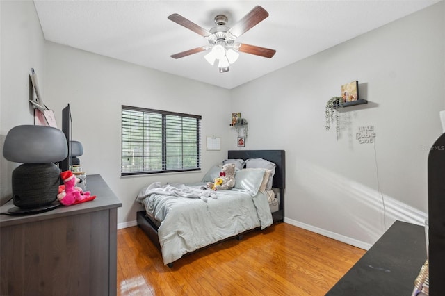 1108 Blackwater Dr, Wesley Chapel, FL 33543 - bedroom with baseboards, light wood finished floors, and ceiling fan