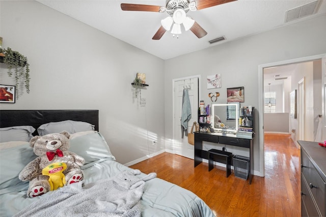 1108 Blackwater Dr, Wesley Chapel, FL 33543 - bedroom featuring wood finished floors, baseboards, and ceiling fan