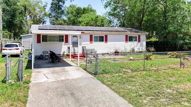 view of front of house with solar panels and entry steps