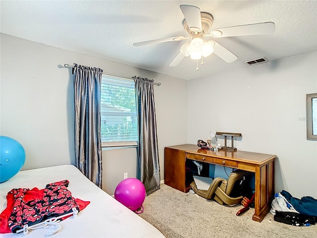 carpeted bedroom featuring a ceiling fan