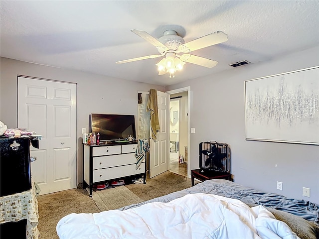 bedroom featuring carpet and a ceiling fan