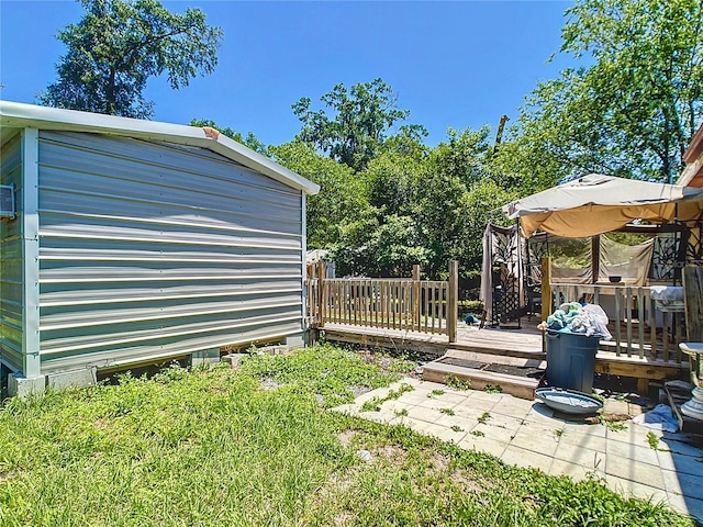 view of yard with a wooden deck