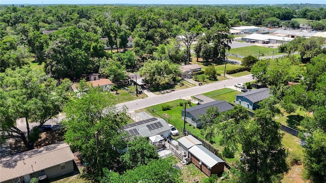 aerial view of residential area with a forest