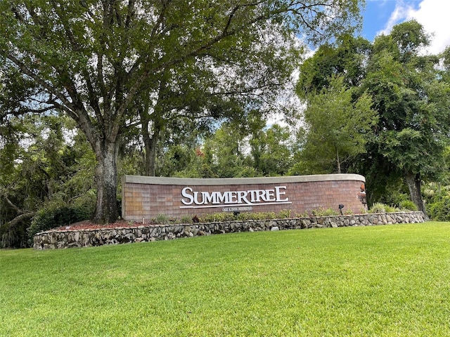 11619 Boynton Ln, New Port Richey, FL 34654 - community sign featuring a lawn