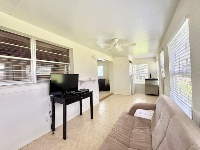 11619 Boynton Ln, New Port Richey, FL 34654 - tiled living room with ceiling fan