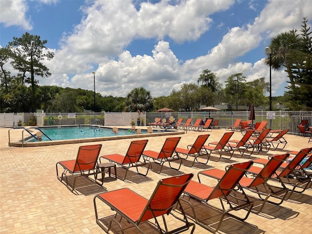 11619 Boynton Ln, New Port Richey, FL 34654 - community pool with a patio