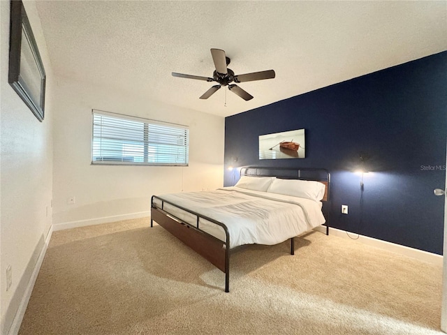 11619 Boynton Ln, New Port Richey, FL 34654 - bedroom with carpet flooring, baseboards, and ceiling fan