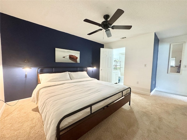 11619 Boynton Ln, New Port Richey, FL 34654 - bedroom featuring light carpet, baseboards, a textured ceiling, and ceiling fan