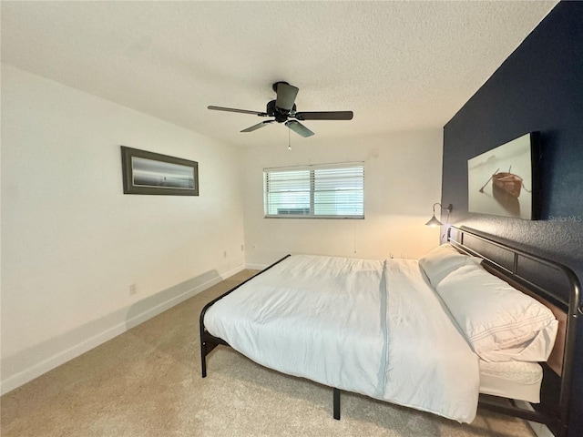 11619 Boynton Ln, New Port Richey, FL 34654 - bedroom with a ceiling fan, baseboards, and carpet