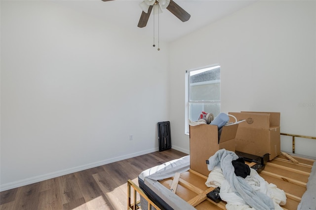 15159 Durango Cir, Brooksville, FL 34604 - bedroom featuring wood finished floors, baseboards, and a ceiling fan