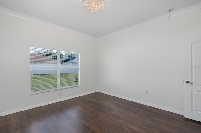 15159 Durango Cir, Brooksville, FL 34604 - unfurnished room featuring dark wood-style floors, a chandelier, crown molding, and baseboards