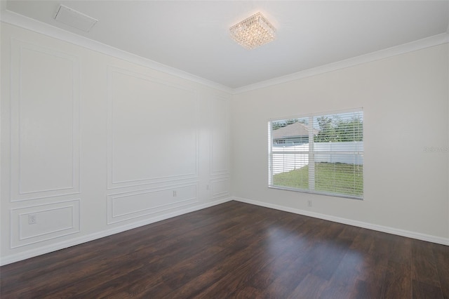 15159 Durango Cir, Brooksville, FL 34604 - spare room featuring dark wood finished floors, baseboards, and ornamental molding