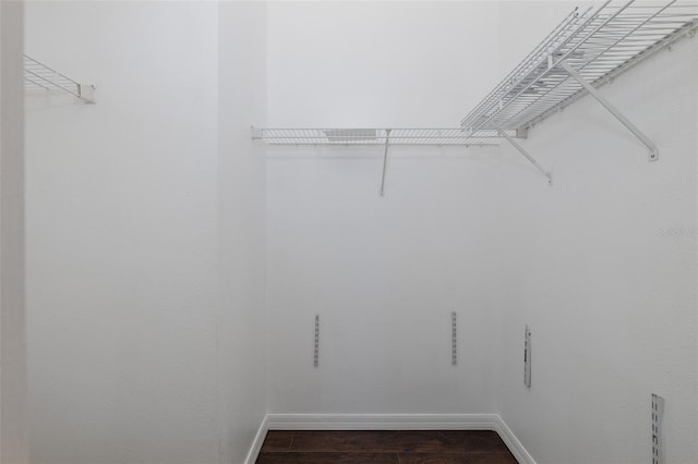 15159 Durango Cir, Brooksville, FL 34604 - walk in closet featuring dark wood finished floors