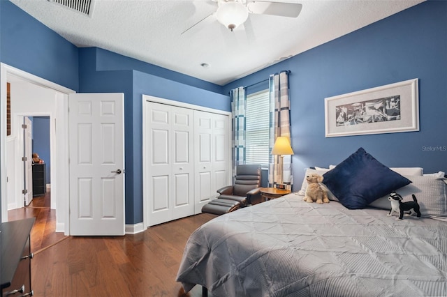 3243 Stonegate Falls Dr, Land O Lakes, FL 34638 - bedroom featuring wood finished floors, a closet, ceiling fan, and baseboards