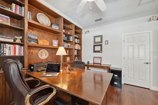 3243 Stonegate Falls Dr, Land O Lakes, FL 34638 - office area featuring ceiling fan, dark wood-style floors, and a textured ceiling