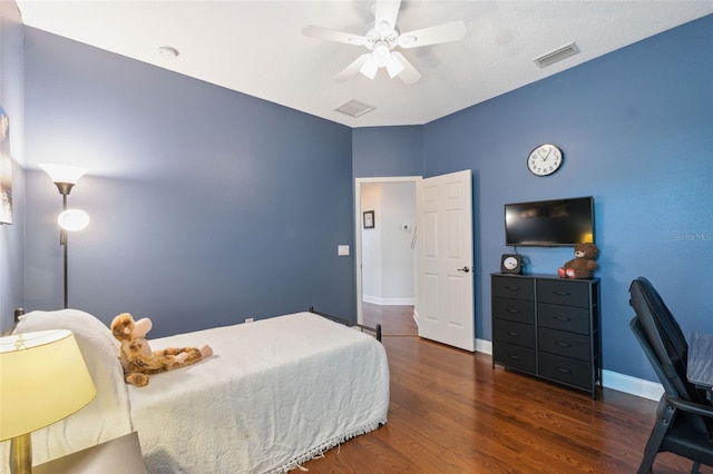 3243 Stonegate Falls Dr, Land O Lakes, FL 34638 - bedroom featuring wood finished floors, a desk, baseboards, and a ceiling fan