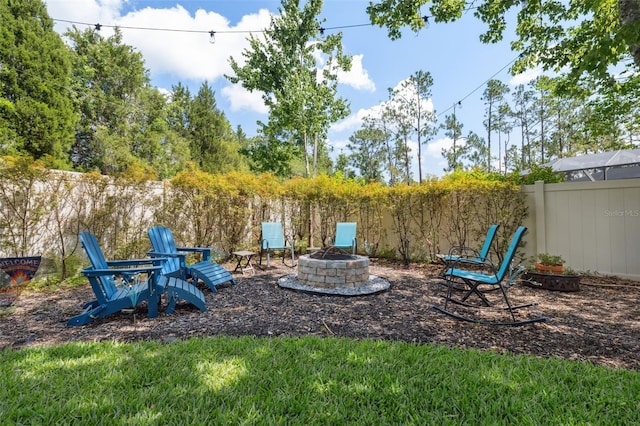 3243 Stonegate Falls Dr, Land O Lakes, FL 34638 - view of yard featuring a fire pit