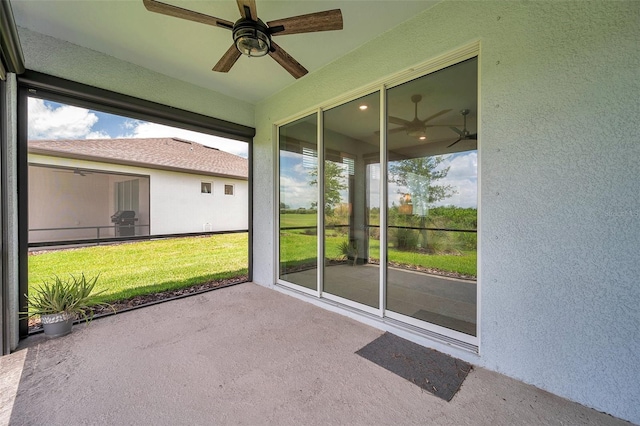 8431 Ocean Tides Cv, Parrish, FL 34219 - unfurnished sunroom with a ceiling fan