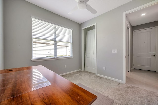 8431 Ocean Tides Cv, Parrish, FL 34219 - unfurnished office featuring light carpet, ceiling fan, and baseboards