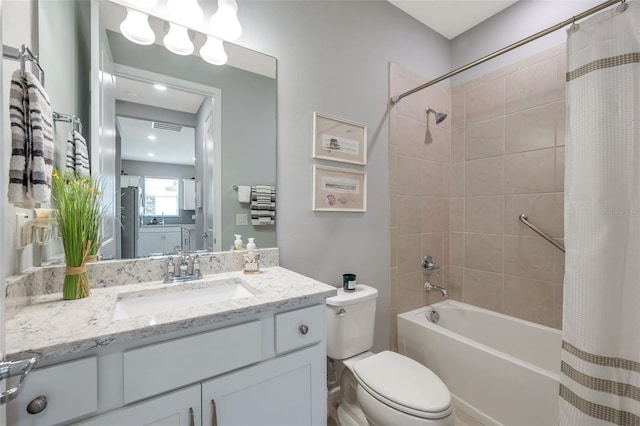 8431 Ocean Tides Cv, Parrish, FL 34219 - full bath featuring toilet, shower / tub combo, and vanity