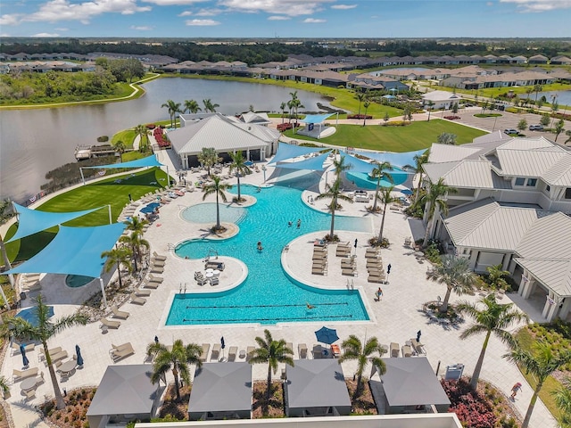 8431 Ocean Tides Cv, Parrish, FL 34219 - aerial view of residential area with a large body of water and a pool