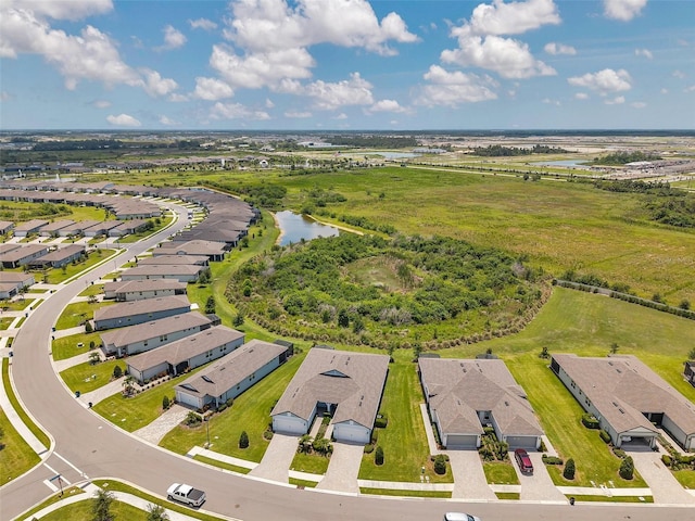 8431 Ocean Tides Cv, Parrish, FL 34219 - aerial perspective of suburban area with a nearby body of water