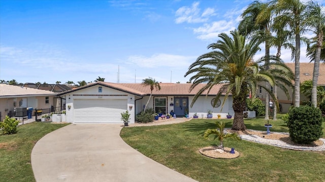 5340 Pilots Pl, New Port Richey, FL 34652 - ranch-style house with a garage, a tiled roof, concrete driveway, and a front yard
