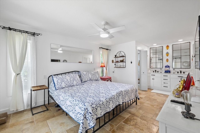 5340 Pilots Pl, New Port Richey, FL 34652 - bedroom featuring stone tile floors, recessed lighting, and a ceiling fan