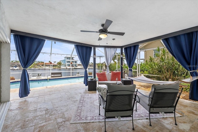 5340 Pilots Pl, New Port Richey, FL 34652 - view of patio with ceiling fan and a water view