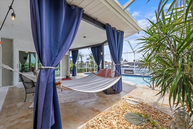 5340 Pilots Pl, New Port Richey, FL 34652 - view of patio / terrace with an outdoor pool and glass enclosure