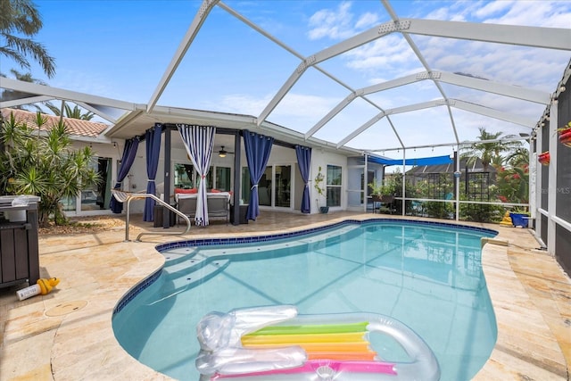 5340 Pilots Pl, New Port Richey, FL 34652 - swimming pool featuring a patio area, a ceiling fan, and glass enclosure