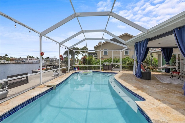 5340 Pilots Pl, New Port Richey, FL 34652 - swimming pool featuring a patio area, a water view, and a lanai