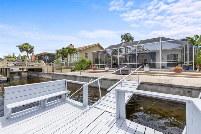 5340 Pilots Pl, New Port Richey, FL 34652 - dock area with a water view, glass enclosure, and a residential view