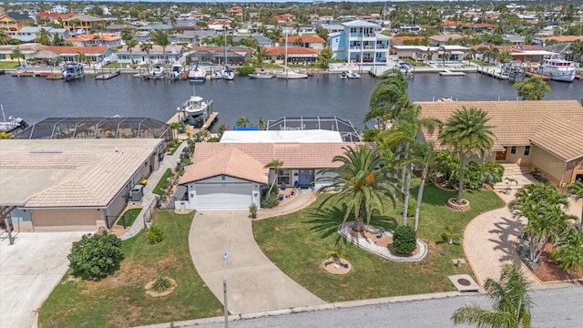 5340 Pilots Pl, New Port Richey, FL 34652 - aerial perspective of suburban area with a large body of water