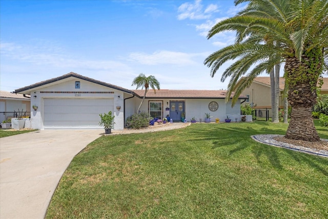 5340 Pilots Pl, New Port Richey, FL 34652 - ranch-style home with stucco siding, driveway, a front lawn, an attached garage, and french doors