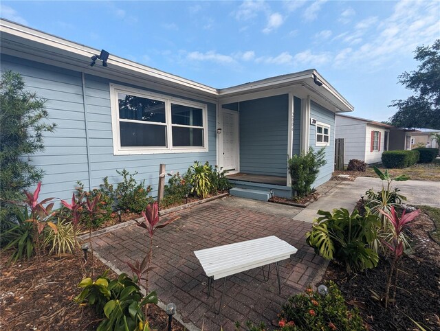 2004 Culberson Ave, Dunedin, FL 34698 - view of front of property with a patio