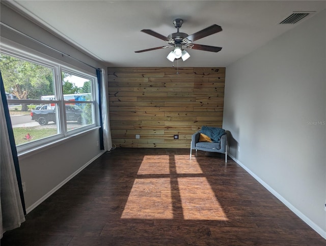 2004 Culberson Ave, Dunedin, FL 34698 - unfurnished room with ceiling fan, wood finished floors, and baseboards