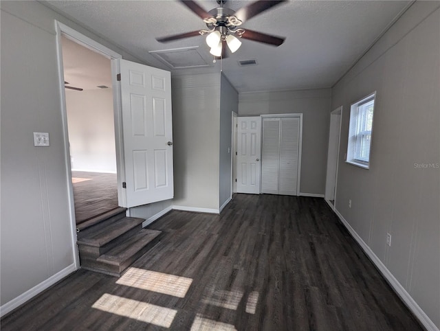 2004 Culberson Ave, Dunedin, FL 34698 - unfurnished bedroom with wood finished floors, baseboards, and a closet