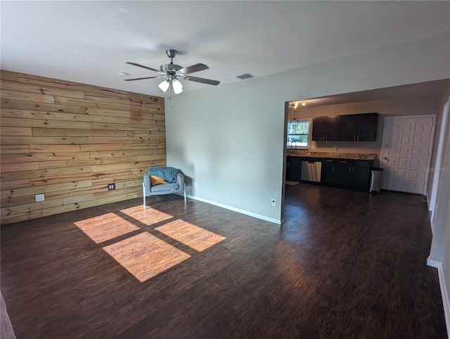 2004 Culberson Ave, Dunedin, FL 34698 - empty room with dark wood-style floors, ceiling fan, and baseboards