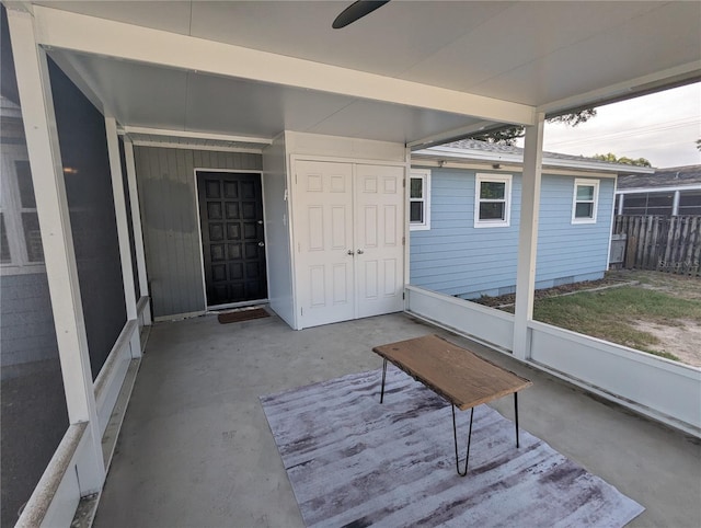 2004 Culberson Ave, Dunedin, FL 34698 - unfurnished sunroom featuring a ceiling fan