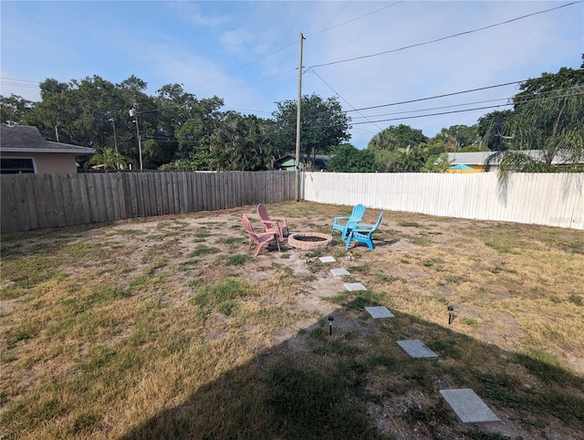 2004 Culberson Ave, Dunedin, FL 34698 - view of yard with an outdoor fire pit