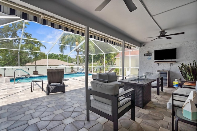 view of patio with a ceiling fan, an outdoor living space, an outdoor pool, and a lanai