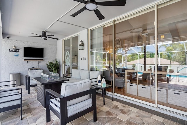 view of patio / terrace with a ceiling fan and outdoor lounge area