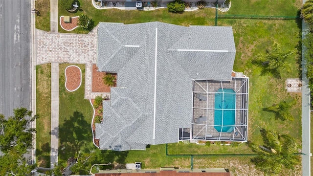 view of subject property with a pool area