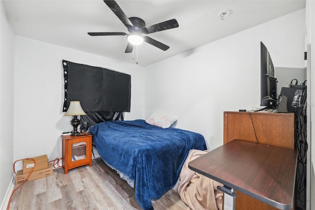 4737 6th St, Zephyrhills, FL 33542 - bedroom featuring light wood-type flooring and a ceiling fan